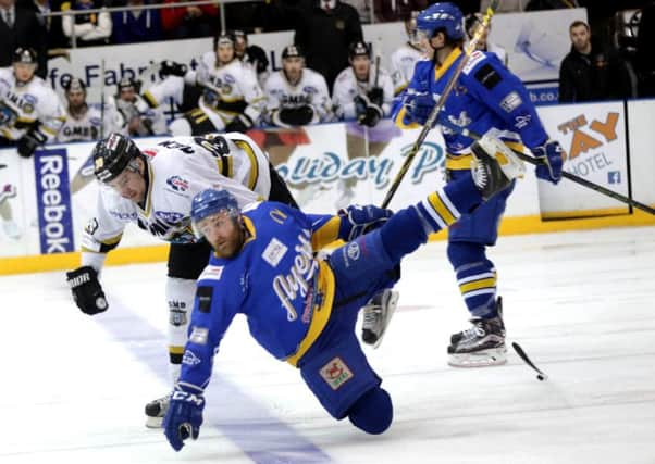 Tommy Muir takes a tumble during last weekend's 2-1 overtime defeat at home to Nottingham Panthers. Pic: Steve Gunn