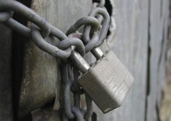 A chain and padlock will make it harder for thieves to gain entry to your shed or outbuilding