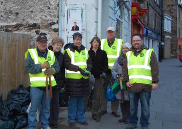 Floral Action Burntisland during a recent litter pick, with chairman Scott Sweaton (right).