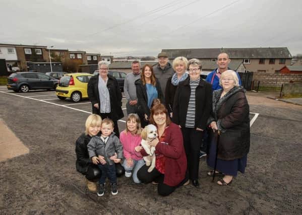 Members of the Tenants and Residents Association at the new car parking area.