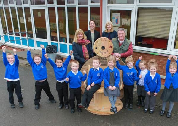 Pictured Alice Soper, Jacqueline Crawford (DHT), Mary Caldwell (HT) and Les Soper with kids from Primary 1. Picture by Steven Brown Photography.