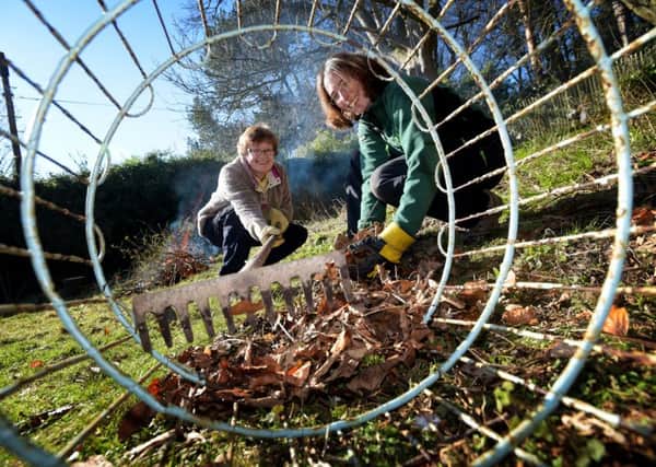 Alison Watson, left, a member of the 200th Branching Out group from FEAT, and programme manager Natalie Moriart at Silverburn Park in Leven. (Pic by Jane Barlow.)