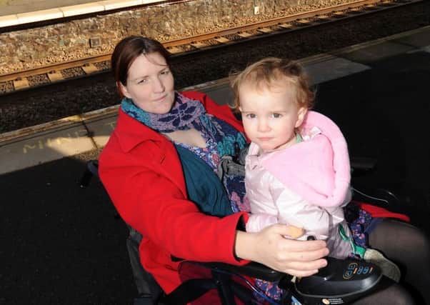 Lizzie Cass-Maran at the station with daughter Dora (22 months).  Pic: Fife Photo Agency