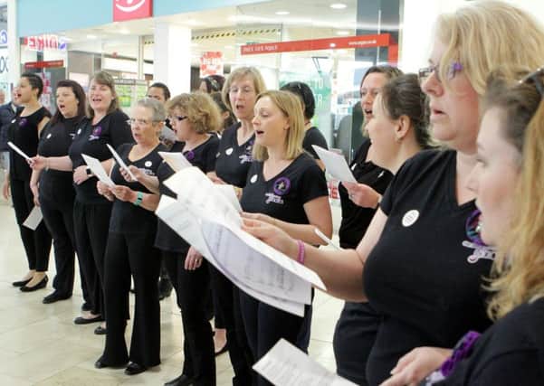 OVERGATE, DUNDEE PREPARES TO WELCOME MILITARY WIVES FLASH CHOIR
GROUP SET TO HIT THE RIGHT NOTE FOR VETERAN FUNDRAISING CAMPAIGN
Military wives from Leuchars helped the Give A Little For Veterans fundraising campaign by organising a flash choir at the Overgate Centre, Dundee. Funds raised go directly to supporting the charitys vital work which includes providing befriending and comradeship support, respite care and disablement pension advice to veterans of all ages.
Charlie Brown, chairman, Legion Scotland, said: I thought it would be a unique way to raise awareness of our campaign and strengthen links between the local ex-service community and the serving community at Leuchars. We are delighted that the Military Wives Choir are backing our campaign. As a nation we are very good at remembering those who fell in conflicts but sometimes we forget those who survived, or are unaware of the difficulties some may face after leaving the Armed Forces.