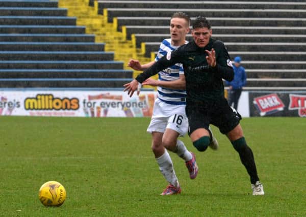 Ross Callachan battles for possession with Morton's Bobby Barr. Pics: Eddie Doig