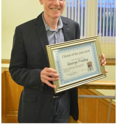 Anstruther's Citizen of the Year is George Findlay, Announced at a reception being held in the Anstruther Town Hall.  Ltr George Findlay Elizabeth Gordon, and Andrew Peddie Chairman Community council.11 April 16