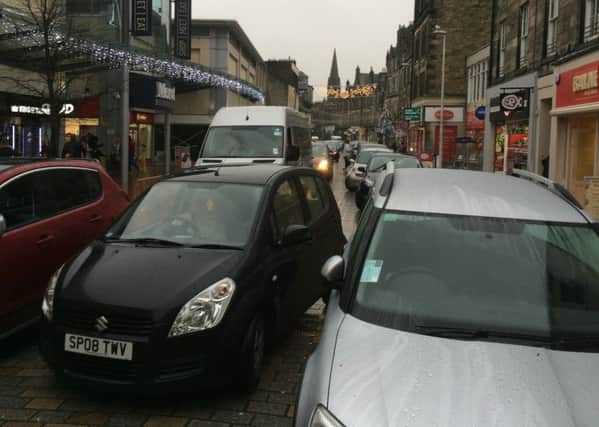 Cars backed up in the pedestrianised zone of Kirkcaldy High Street