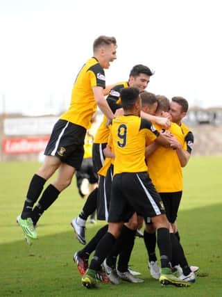 Stevie Campbell is congratulated by teammates after scoring East Fife's goal  -  credit - fife photo agency -