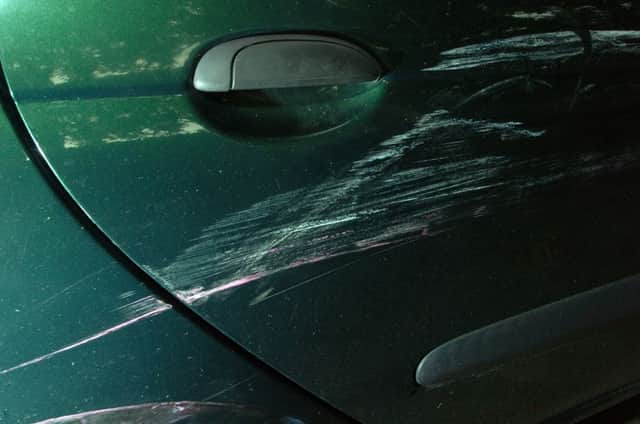 Have you ever come back to your car to discover it damaged? Stock pic: Bill Henry
