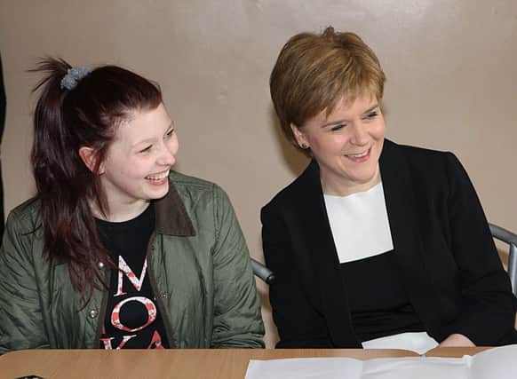 Nicola Sturgeon with Taylor Muir in the Youth Cafe.