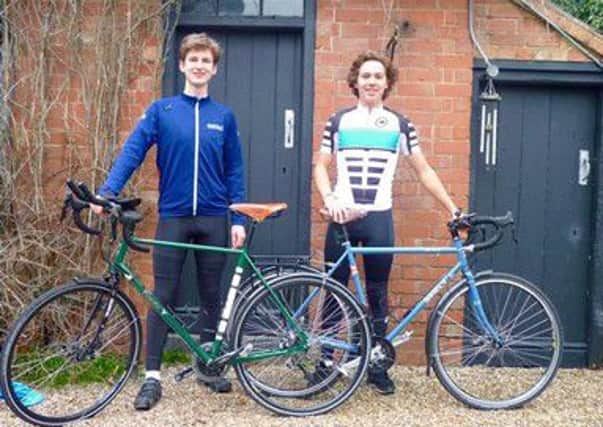 Charles Stevens, left, will cycle the Silk Road with William Hsu, right