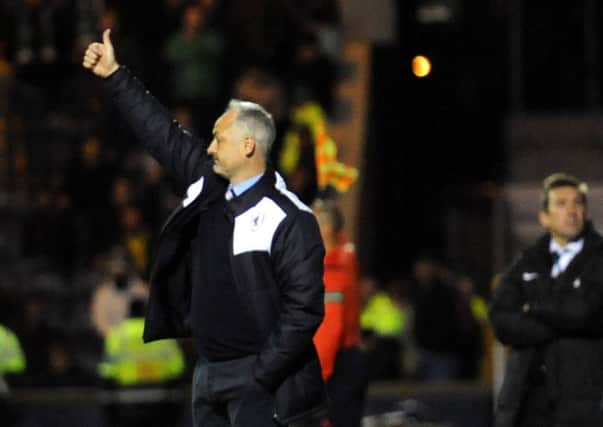 Stark's Park - Kirkcaldy - Fife - 
 Championship Play-off - Raith v Hibs - 
Manager RAY MCKINNON gives the thumbs up a minute before final whistle - 
credit - FPA  -