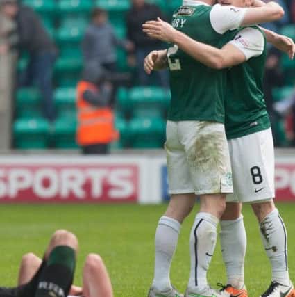 Hibs players David Gray and Fraser Fyvie at full time. Pic: Toby Williams.