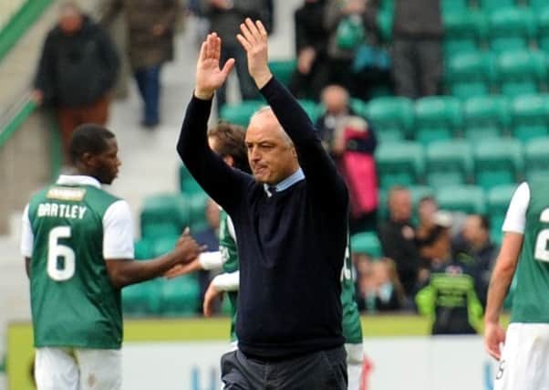 Easter Road - Edinburgh - Fife - 
Premiership play-off 2nd leg - Hibs v Raith - 
Manager RAY MCKINNON applauds the fans after the final whistle - 
credit - FPA  -