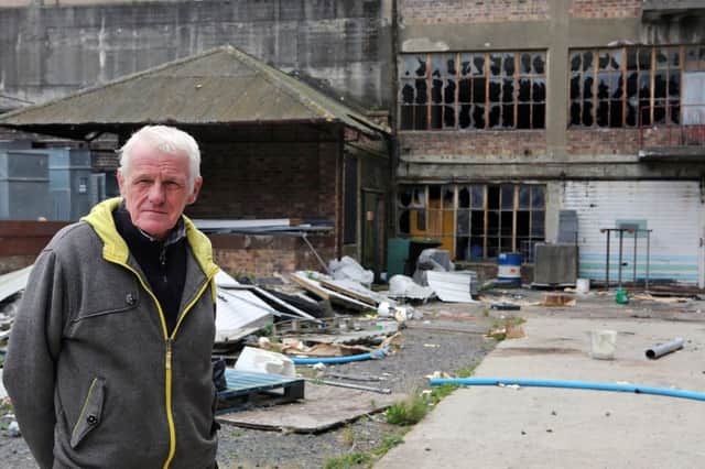 Bob Beveridge at the vandalised old factory site.