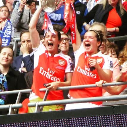 Emma Mitchell, on the right, enjoys her Wembley moment