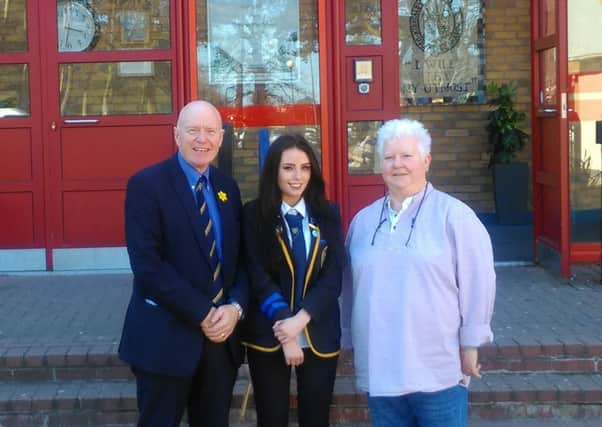Rachel Deas, pupil at KHS is chosen as the first recipient of the Val McDermid Bursary a new annual award of Â£500 to a deserving student leaving home for further education. Rachel is pictured with Derek Allan, rector and Val.