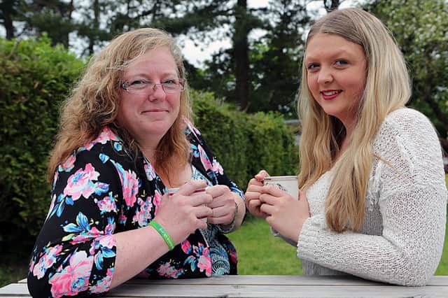 Leigh Smith (left) with Caitlin Anderson of the Golf Tarvern in Cupar.