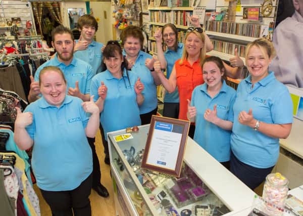 Staff and placements at Fife Shopping & Support Services Charity Shop in Kirkcaldy. Pic: Steven Brown.