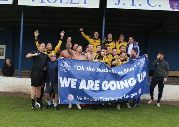 Dundonald Bluebell celebrate promotion to the Super League.