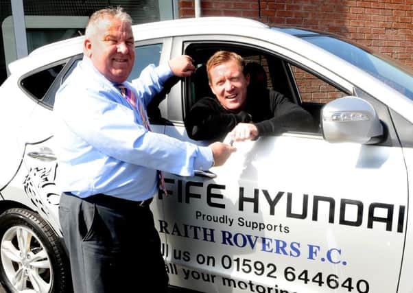 Raith manager Gary Locke receives the keys to his new club car from Stuart McPhail at sponsors Fife Hyundai. Pic: Tony Fimister