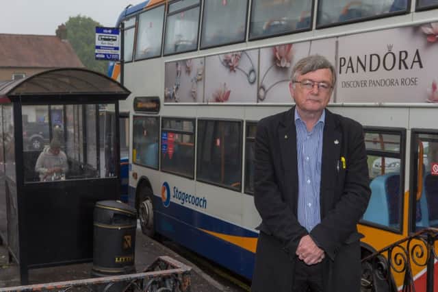 Cllr David Alexander at the bus stop in Kennoway where Stagecoach are cancelling the daily service affecting many people who need to get to appointments in Kirkcaldy. Picture Steven Brown