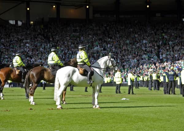 Police horses on the pitch at Hampden