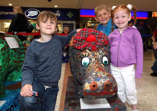 Kinglassie nursery pupils, Harley Comb, Erin Ritchie and Hamish Muir, with their entry to the parade last year.  Pic: Dave Scott.