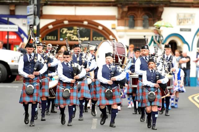 The pipe band will lead the parade again this year.