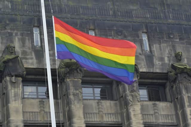 A rainbow flag flies at half mast outside the Scottish Government Office, Edinburgh.