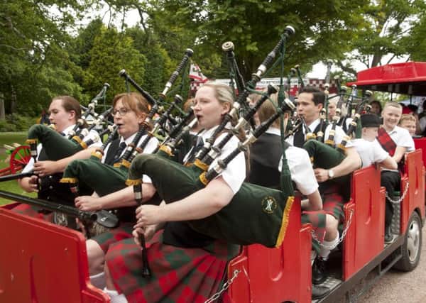 The City Pipe Band take a tour of the park at last year's Country Fayre.