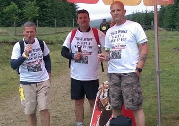 From left, John McBride, Graeme Cunningham and Colin Henderson, who took part in the grueling Cateran Yomp and raised more than Â£2000 for the Army Benevolent Fund  - the Soldiers Charity.