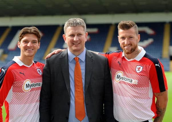 New Raith Rovers away strip launch - Iain Davidson and Ross Callachan with Eric Low, chief executive of Myeloma -  credit - FPA  -