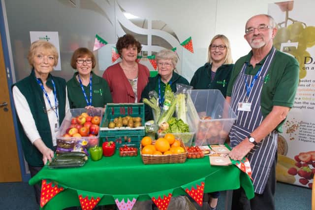 Glenrothes Foodbank Volunteers with the new fresh fruit and veg counter. Pictured from Left: Wilma Hadden, Joan Grant, chairman Lindsay Clark, Pat Toy, Gilly Guild and David Toy. Picture: Steven Brown