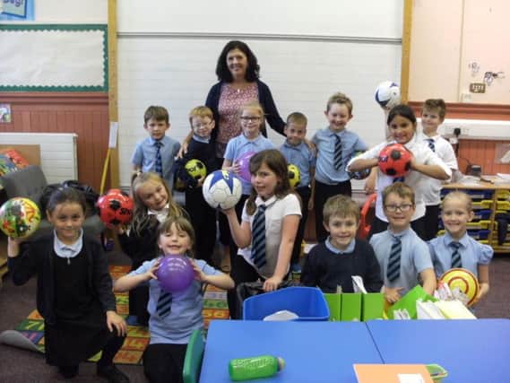 Pupils at Denend PS in Cardenden say farewell to  teacher Mrs Carolyn Scott