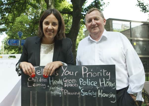 Happier days: Kezia Dugdale and Alex Rowley (pictured together last year) now differ in their stance over Jeremy Corbyn