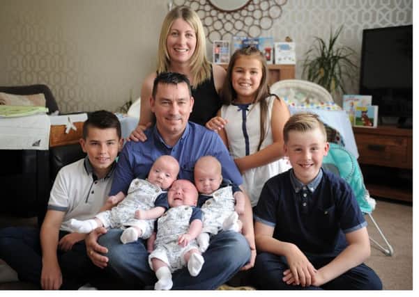 Gillian and Alan Johnston had triplets in April! From left the babies Lewis Callum Kyle with siblings Scott, 10, Carly, 9, Rian, 9.