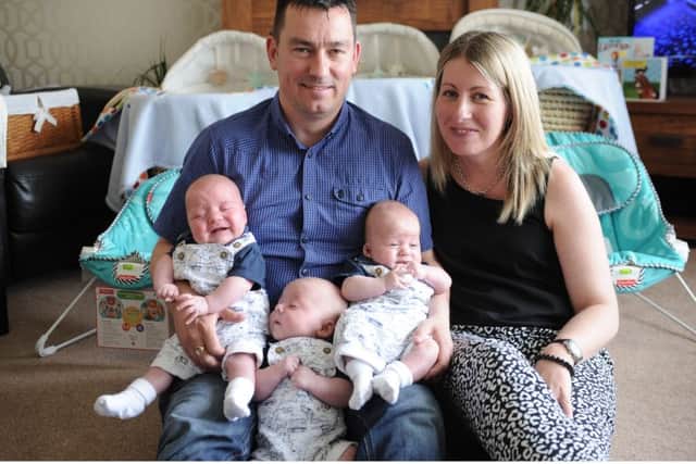 Gillian and Alan Johnston had triplets in April. Babies from left: Lewis, Callum and Kyle pictured with siblings Scott, Carly and Rian at their Kinghorn home.