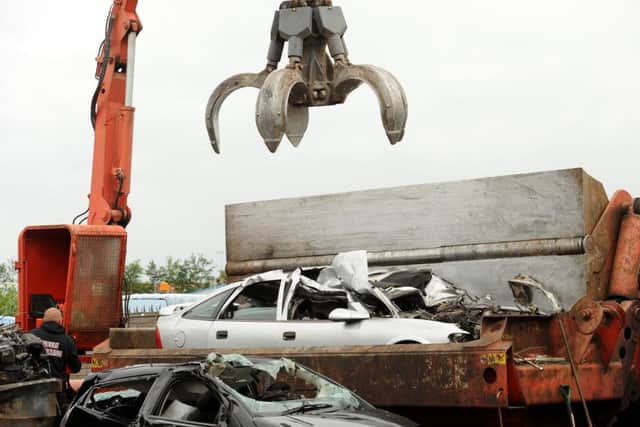 Cars are crushed at Noble Recycling, Kirkcaldy. (Picture: Fife Photo Agency.)