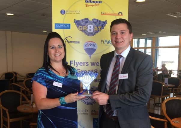Flyers' commercial manager Carol Johnstone with FiFab's Gary Keddie