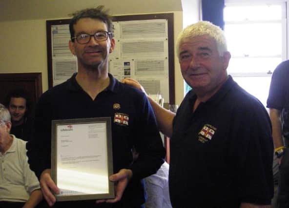 Gary Hughes (left) who was awarded a long service award for his dedication to the RNLI in Anstruther over the last 30 years.