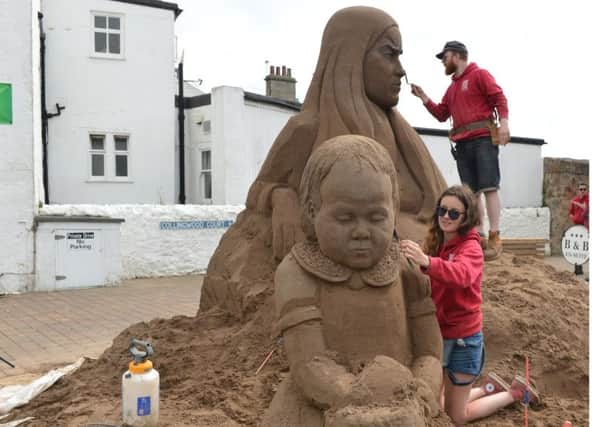Sand sculpture 'Those Left Behind' is created at The Honeypot forecourt on Crail High Street by artists Sand In Your Eye