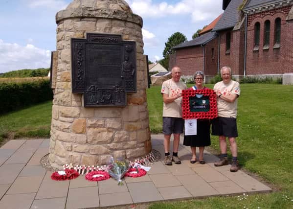 Bert Hannah (right) with walking partner Brian Forrester (left) and the lady Mayor of Contalmaison in the Somme lay a special memorial wreath bearing the names of the seven Raith Rovers players who fought in WW1.