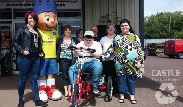 Joe with Lesley Cox; Kingdom FM's mascot; his Aunt Rose; Fiona and Andy Hain; mum Michelle and sister Kerri