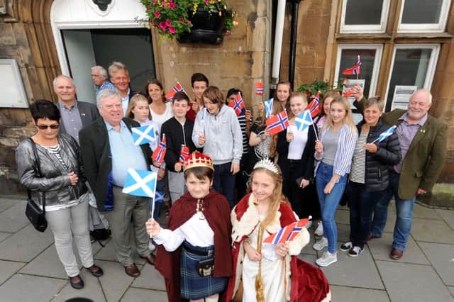 Cllr George Kay welcomes visitors from  Flekkefjord, Norway, Burntislands twin town, and meet the King Lucas Brown & Queen Sophie Brown. All pics: FPA.