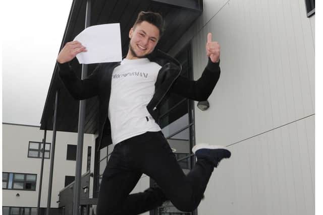 Kieran McCallum (17) jumps for joy
