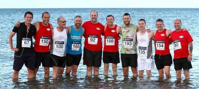 The LLV group cooling off in the sea after the Tour of Fife beach race at St Andrews West Sands.