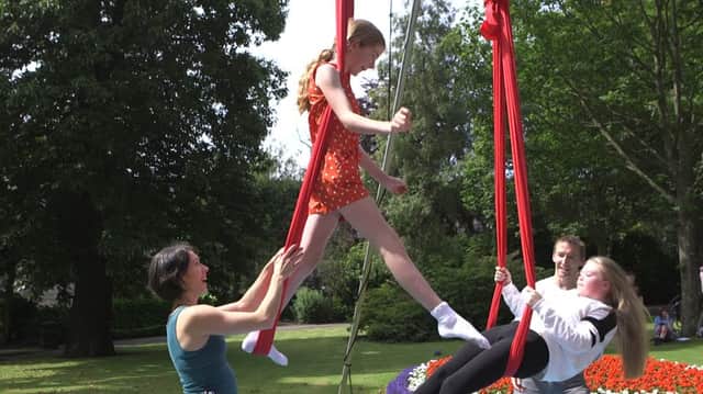 Aerial acrobatics in the War Memorial Gardens at Festival16