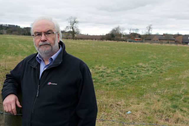 Ceri Williams beside one of the fields off Balgarvie Road, earmarked for some of the Cupar North housing. Pic: Dave Scott.