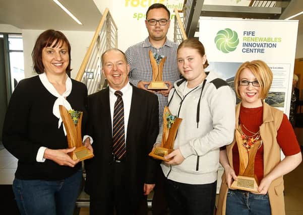 Councillor Tony Martin with some of last year's award winners. Nominations are now being invited for 2016 awards.